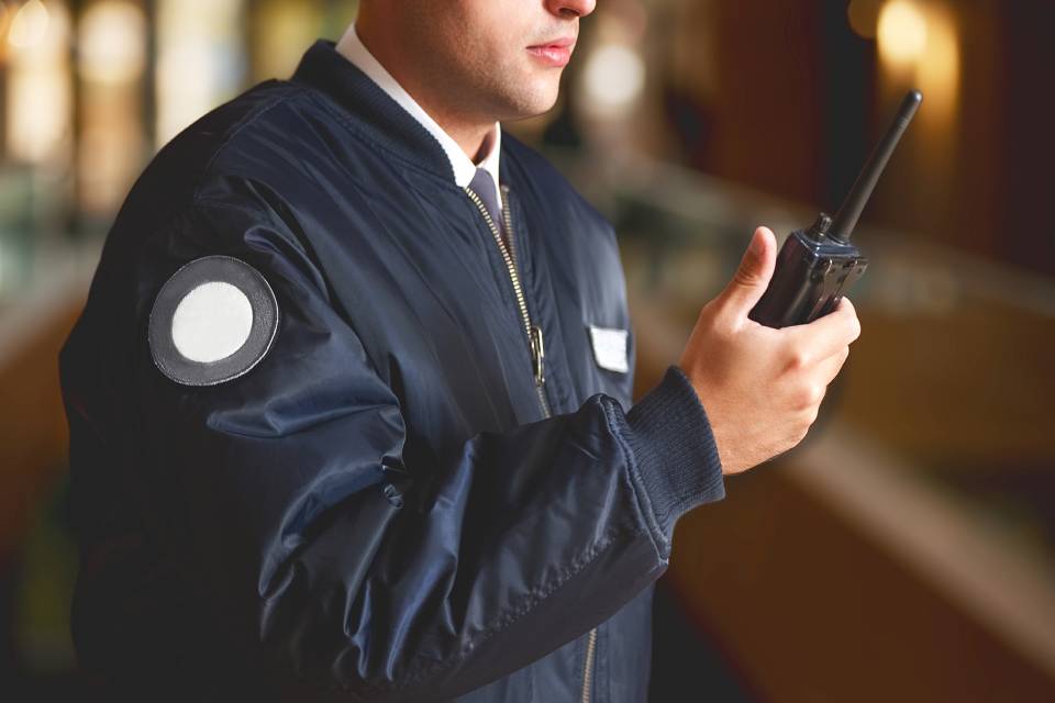 Officer with walkie talkie